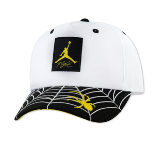 Youth snapback cap in white with black front Jumpman logo patch and yellow accents