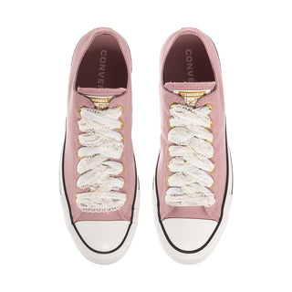 Pair of Women's Chuck Taylor All Star Ox sneakers, front view, petal pink with white laces
