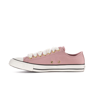 Women's Chuck Taylor All Star Ox sneaker, quarter view, petal pink upper with gold eyelets