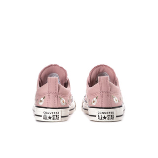 Women's blush pink canvas low-top sneakers, rear view with Converse All Star label