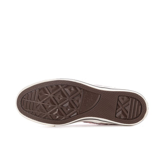 Women's blush pink sneaker outsole with textured tread pattern and contrast edge