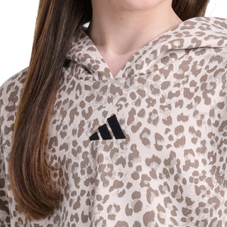 Close-up of youth hoodie hood with leopard print and black logo on chest