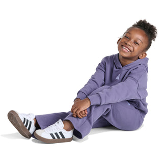 Kids violet fleece set with hoodie and joggers, white logo, child seated
