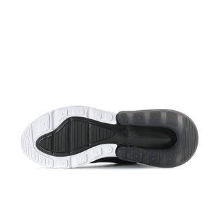 Women’s sneaker outsole bottom view with traction tread and white-and-dark rubber