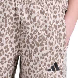 Leopard-print youth pants with elastic waistband and small logo patch on leg