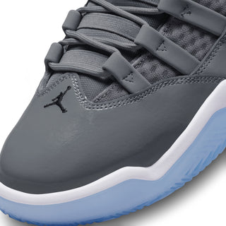 Men's high-top sneakers close-up: dark gray laces and textured tongue panel