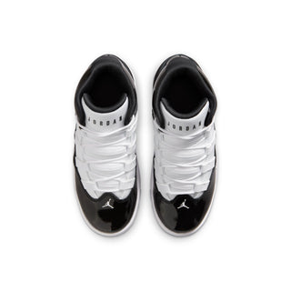 Kids black and white high-top sneakers, heel and tongue view with woven logo details.
