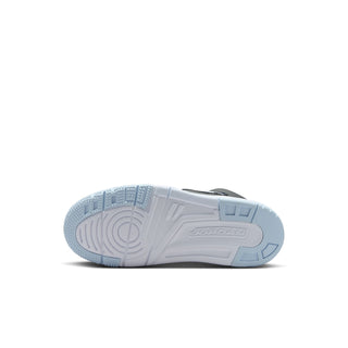 Kids high-top sneaker outsole view in white with Jordan branding and traction tread.