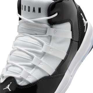 Kids high-top sneaker detail: white padded tongue, black heel, and lace-up straps.