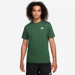Men's green Nike crew-neck t-shirt on model, short sleeves and white chest logo