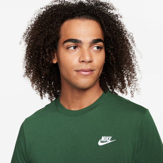 Men's green Nike crew-neck t-shirt close-up with white chest logo