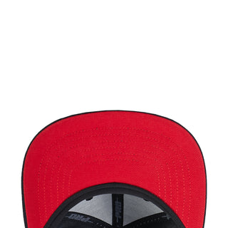 Red interior of snapback cap with black underside and stitched brim