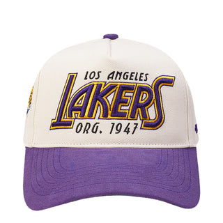 White and purple Los Angeles Lakers snapback cap with front LAKERS logo patch