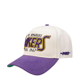 White and purple Lakers snapback cap with embroidered LAKERS logo on front