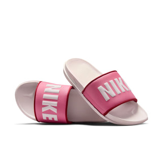 Women's slide sandal, pink/magenta upper with white NIKE lettering on strap