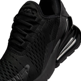 Youth black knit mesh upper close-up with lace eyelets and logo detailing