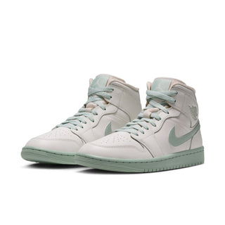 Women's mid-top lace-up sneakers in white with mint swoosh and panel overlays