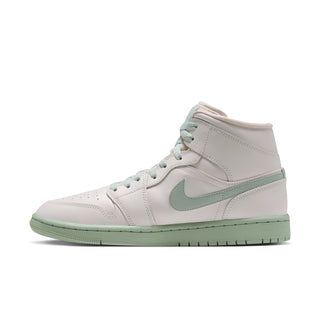 Women's mid-top sneakers side view, white leather with mint swoosh and trim