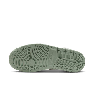 Women's mid-top sneaker outsole in light mint rubber with tread pattern