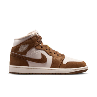 Women's mid-top sneakers in light tan suede with white panels, brown Swoosh, laces