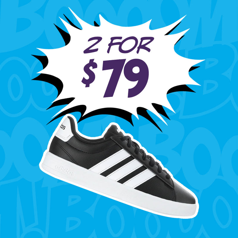 A single black and white Adidas sneaker shown at an angle against a bright blue patterned background, with a white comic-style burst above it reading '2 FOR $79' in purple text.
