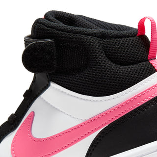 Kids sneaker upper close-up, black fabric collar with pink swoosh and white panel