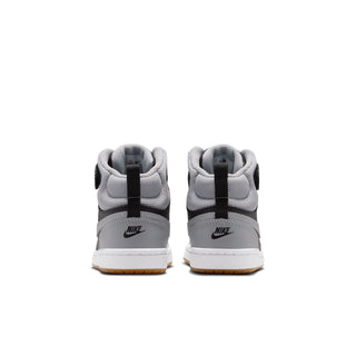 Kids mid-top sneakers from heel view with black heel strap, light gray lining, gum sole.