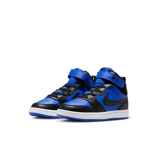 Kids mid-top sneaker pair in royal blue and black with side swoosh details