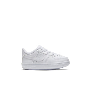 Infant white low-top sneakers with hook-and-loop straps and swoosh logo