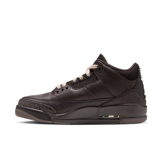 Dark brown high-top women’s sneaker with textured side panel and lace-up closure