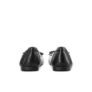 Black womens ballet flats, showing heel backs with bow ties at the openings.