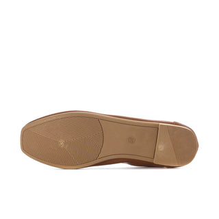 Camel ballet flat outsole with textured tread and small brand logo