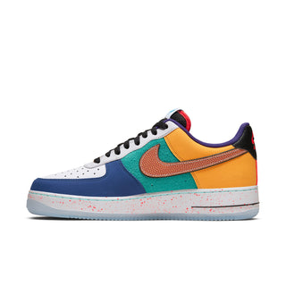 Men's Nike low-top sneaker, side view, white and blue upper with orange and green accents.