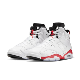 Men's white high-top sneakers with red detailing, black heel panels, and white laces
