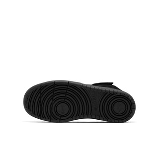 Black rubber outsole for youth mid-top sneaker with circular tread pattern