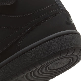 Kids black midsole with textured foam and rubber outsole tread