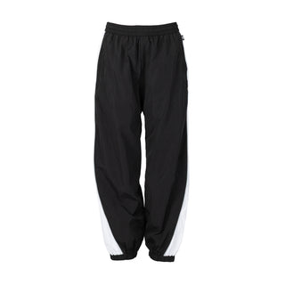 Women’s wind pants in black with white side stripe, elastic cuffs