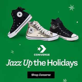 Three Converse shoes on a green background with 'Jazz Up the Holidays' text and Converse logo.