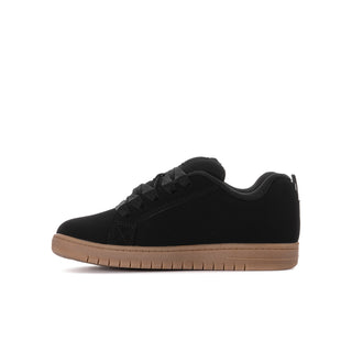 Youth black low-top skate shoes with lace-up closure and gum midsole