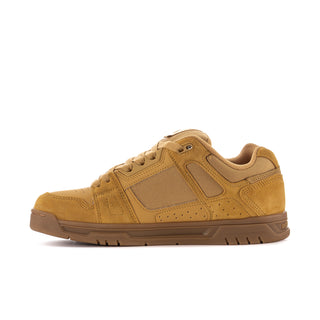 Men's tan low-top sneakers with lace-up front, suede texture, side DC logo