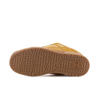 Men's tan sneaker outsole bottom with DC logo and traction tread pattern