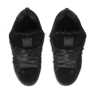 Black low-top sneakers, top view of two shoes with padded tongue and lace-up