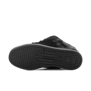 Black women’s sneakers with textured rubber sole and star logo on side