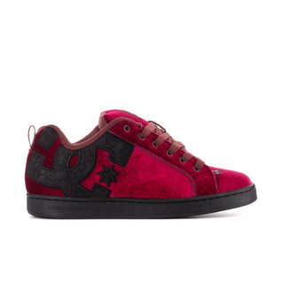 Women's maroon velvet court sneakers with black accents, star logos, and lace-up front