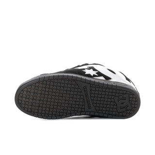 Men's DC skate shoe outsole, black rubber tread with white accent and DC logo