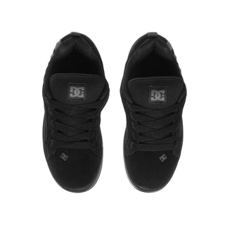 Youth black sneakers, front and back view, cushioned tongue and DC heel logo.