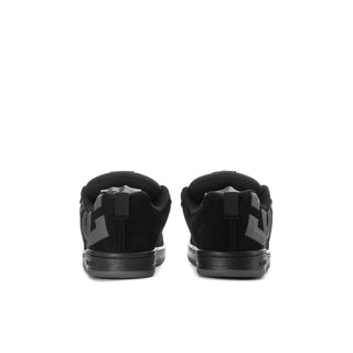 Youth black skate sneakers, rear view with DC logo heel panels and grey sole.