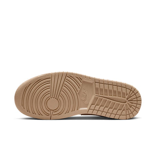 Light tan rubber outsole for Air Jordan 1 low-top sneakers with traction grooves