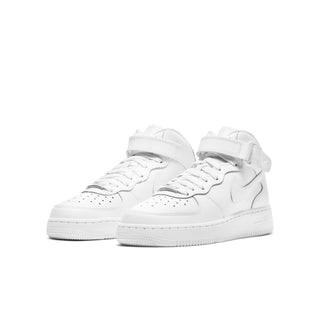 Pair of white youth mid-top sneakers with Nike swoosh and lace-up design