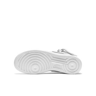 White youth mid-top sneakers, outsole view with textured traction tread